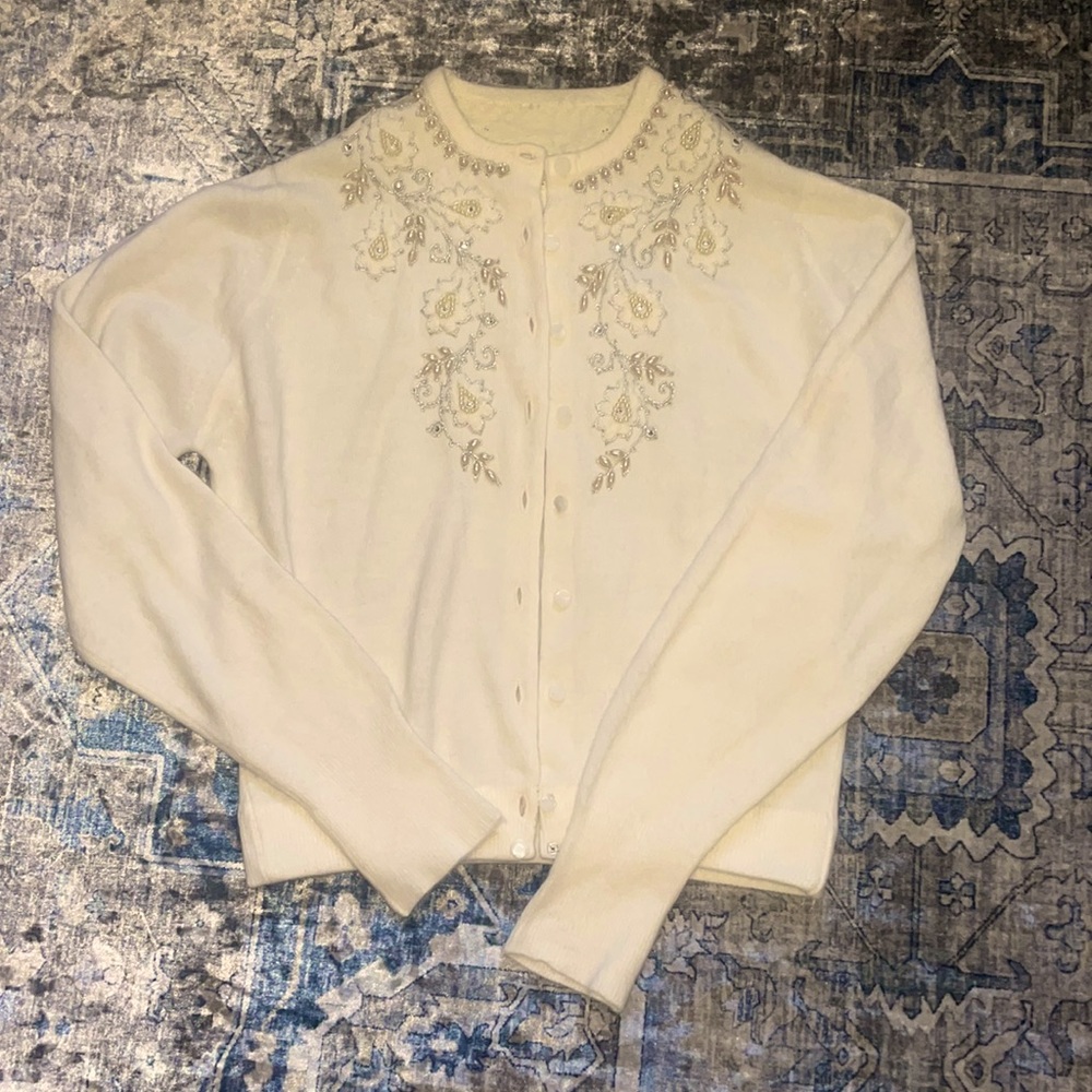 Vintage, cream colored, very soft, beautifully detailed sweater -pearl buttons